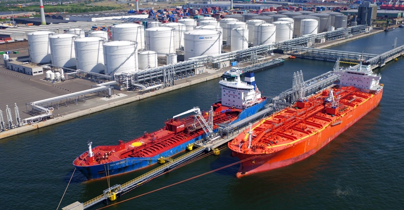 storage ships next to storage tanks